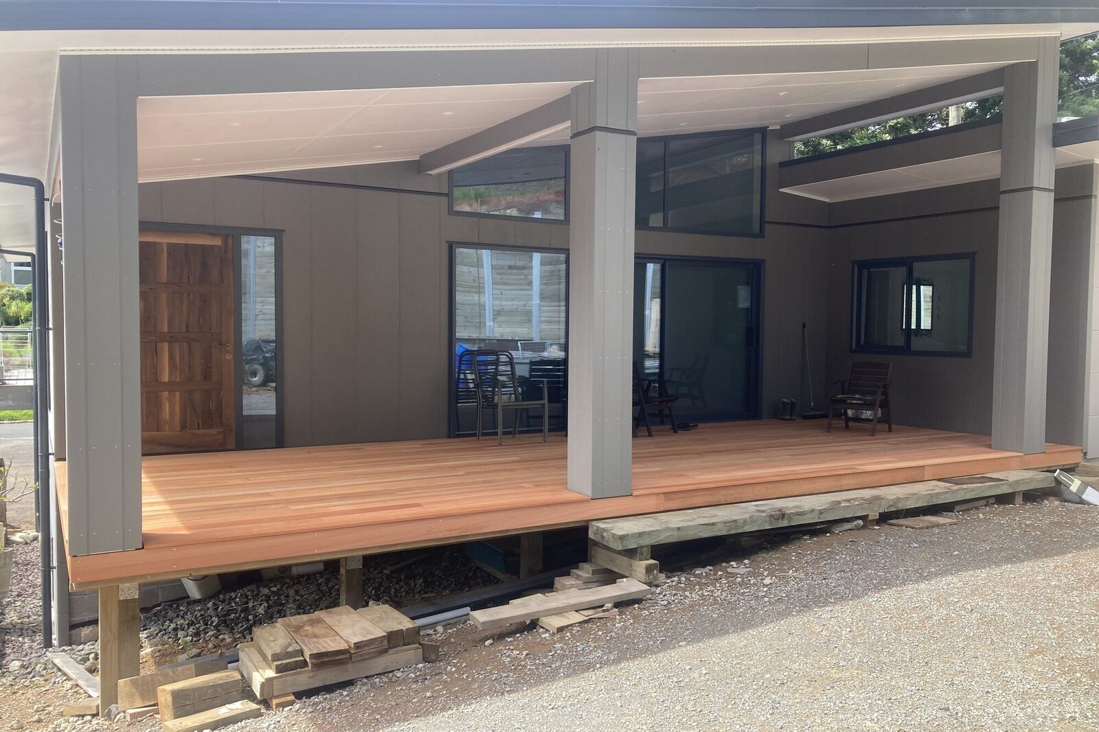 Covered hardwood deck and outdoor living area on a new home