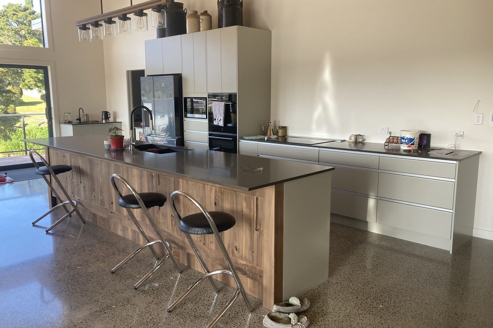 Kitchen island on a polished concrete floor