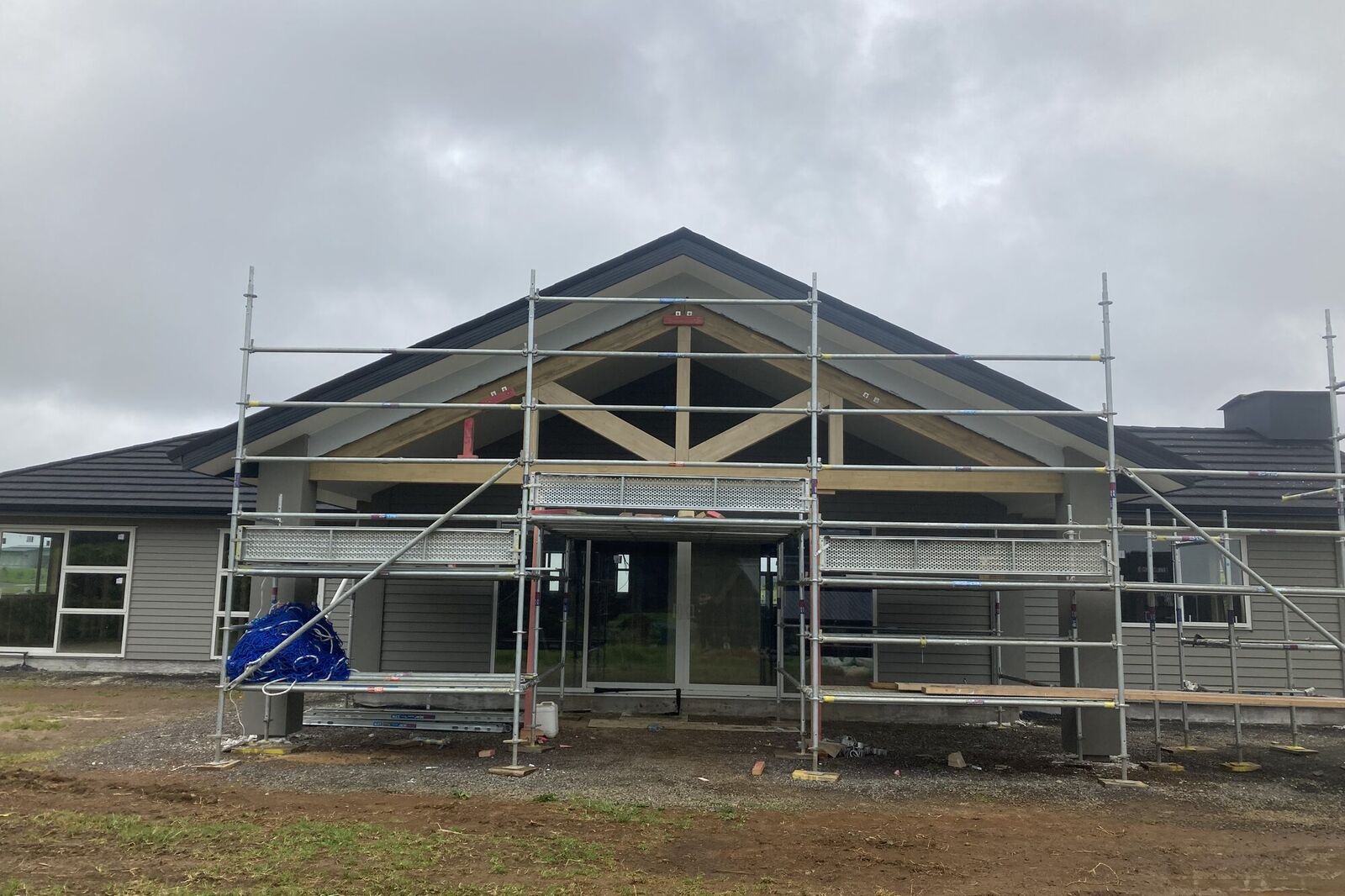 New build gable entry with exposed timber trusses