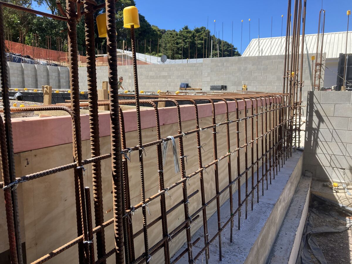 Reinforcing steel and block walls for a concrete foundation