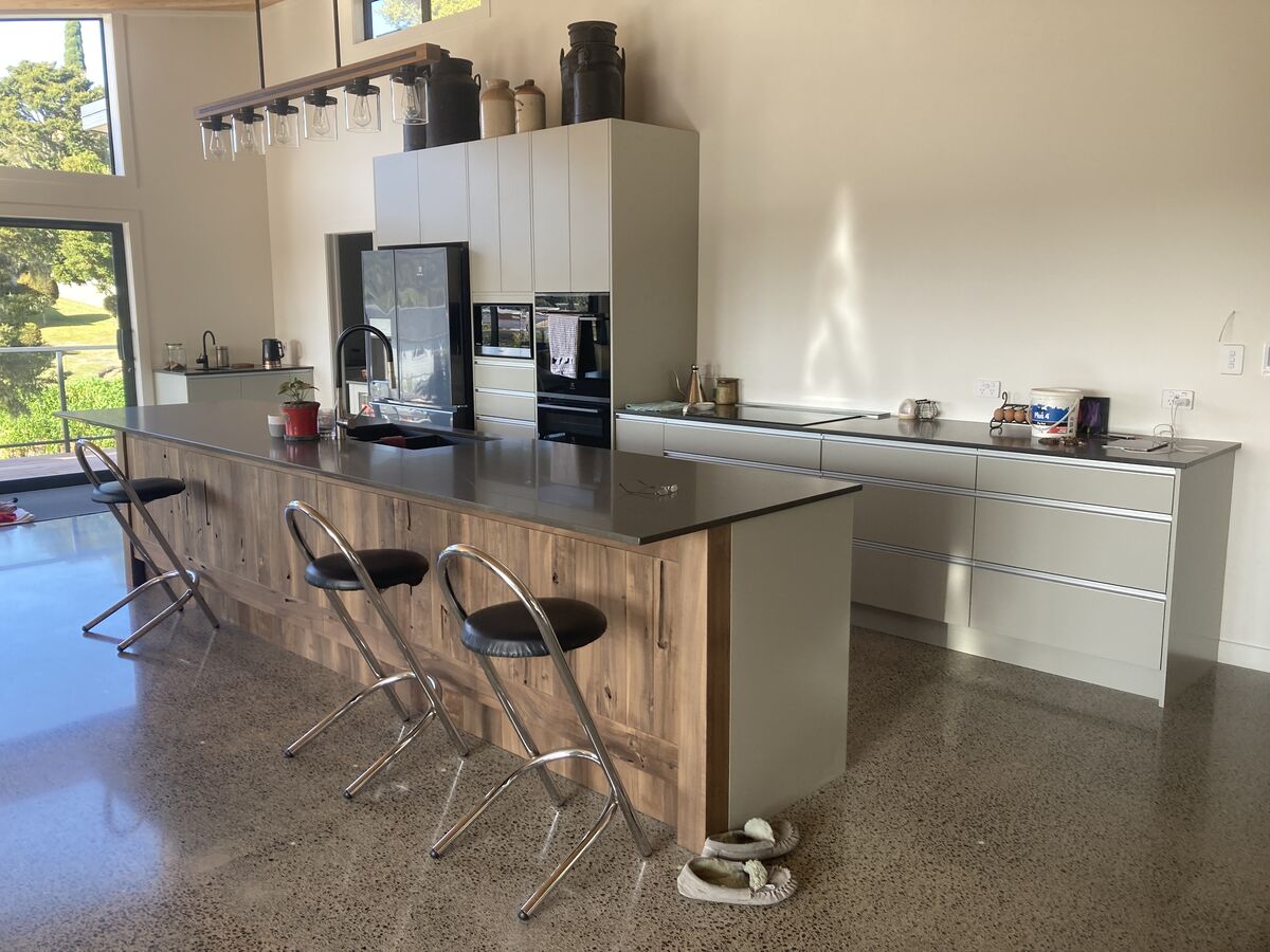 Kitchen island on a polished concrete floor
