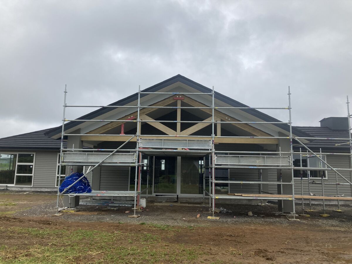 New build gable entry with exposed timber trusses
