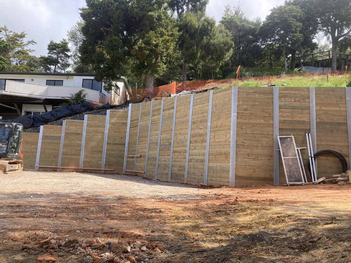 Timber retaining wall stepping up a hillside